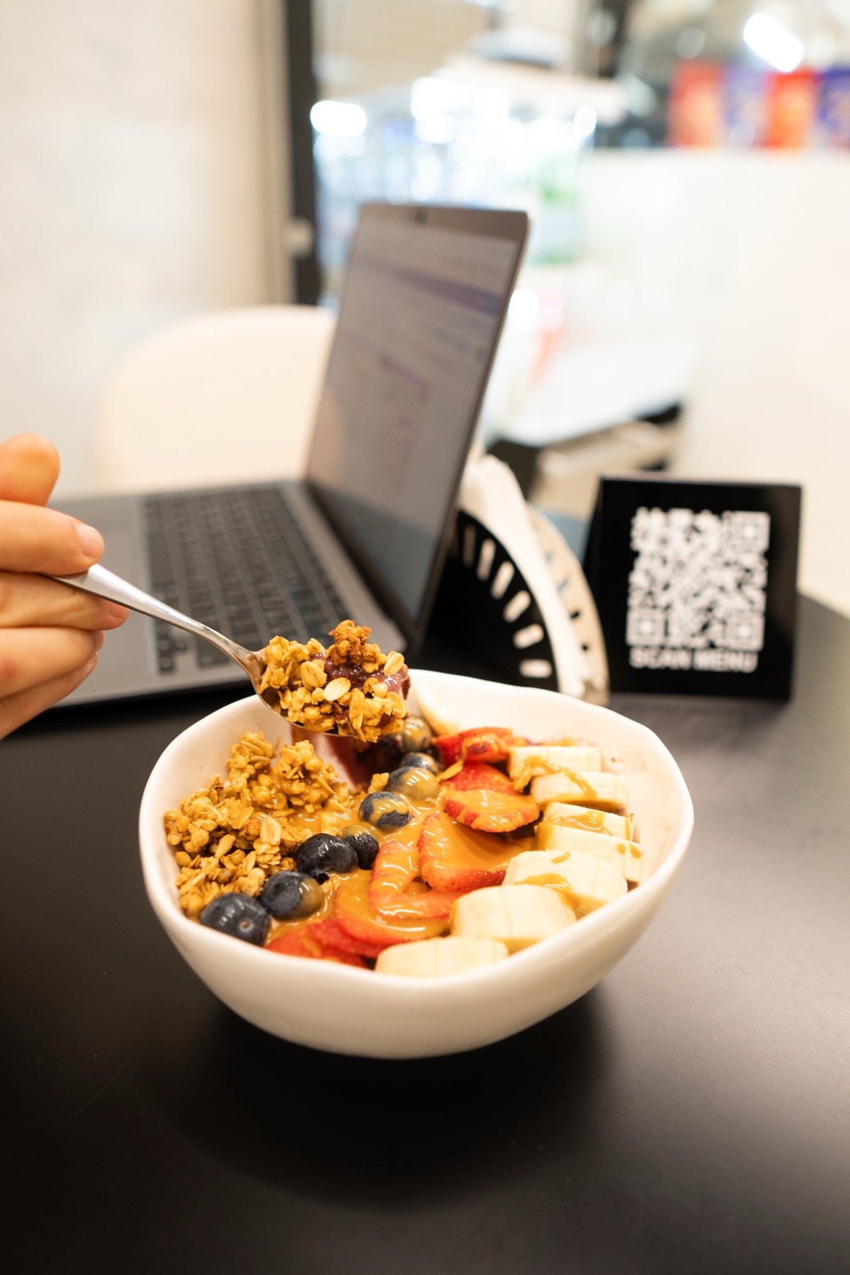 Fresh açaí bowl with granola and fruit
